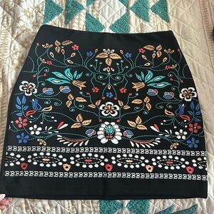 Mexican Style Skirt . The design is printed on . never worn. It is. Size M .